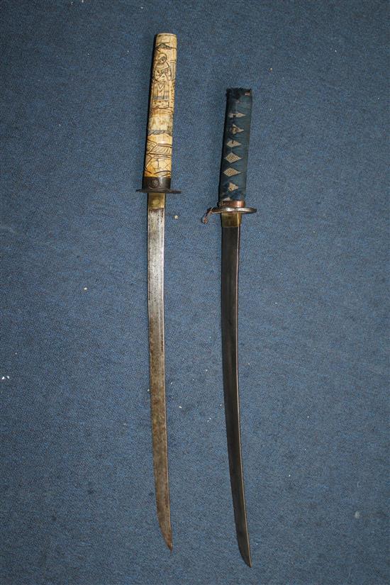 An early 20th century Japanese bone wakizashi and another